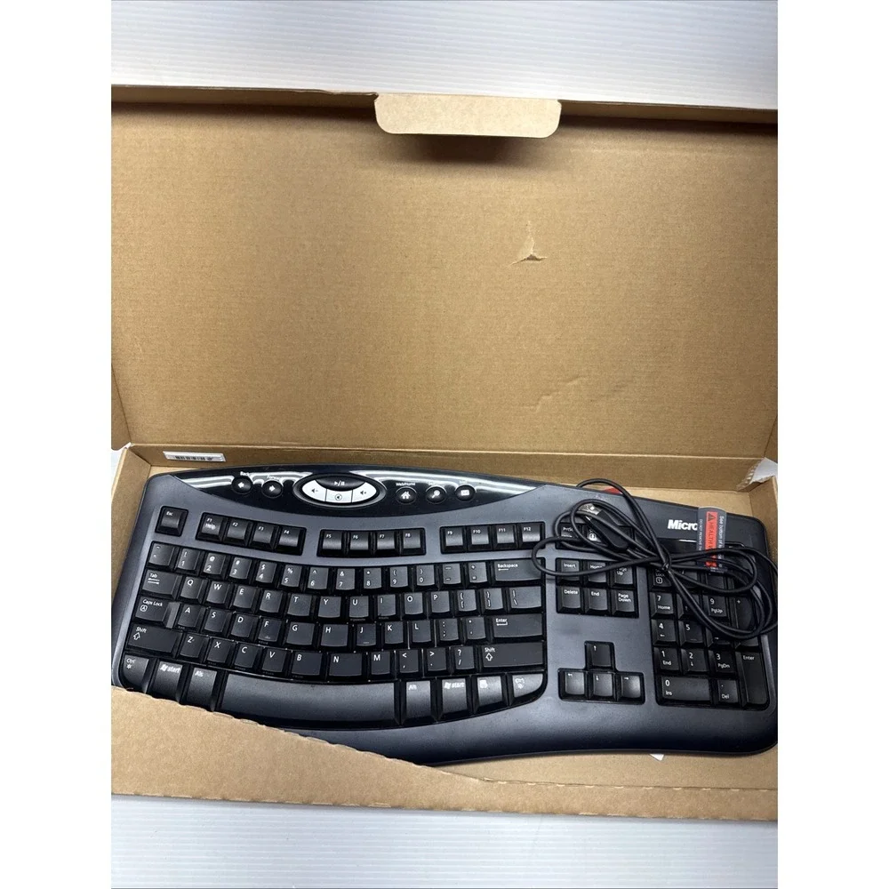 Microsoft Comfort Curve Keyboard 2000 Ergonomic Wired USB Black Model 1047